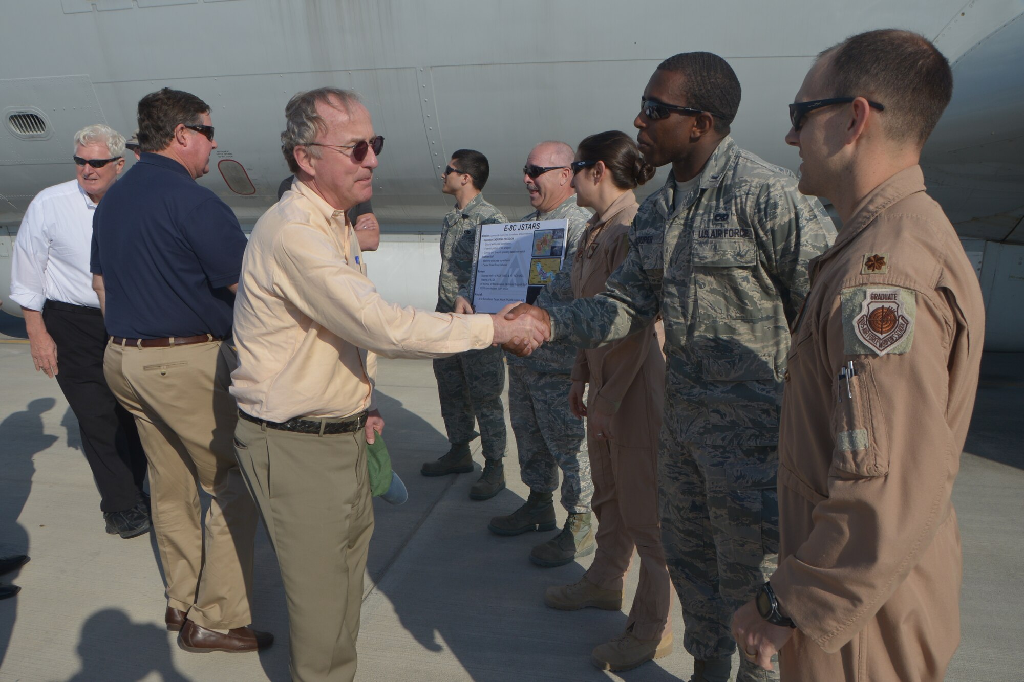 Congressman Rodney Frelinghuysen (R-N.J.) greets Airmen during an E-8C Joint Surveillance Target Attack Radar System demonstration at Al Udeid Air Base, Qatar, Feb. 18, 2014. Three other congressmen from the House of Appropriations Committee, Peter Visclosky (D-Ind.), James Moran (D-Va.) and Ken Calvert (R-Calif.) were also here to visit five Air Force airframes and were briefed on the capability of multiple units on base who support the U.S. Air Forces Central Command area of responsibility and Operation Enduring Freedom. The congressmen also had lunch with Airmen who are from their represented state to discuss any concerns and thank the service members for their hard work.  (U.S. Air Force photo/Senior Airman Jared Trimarchi)