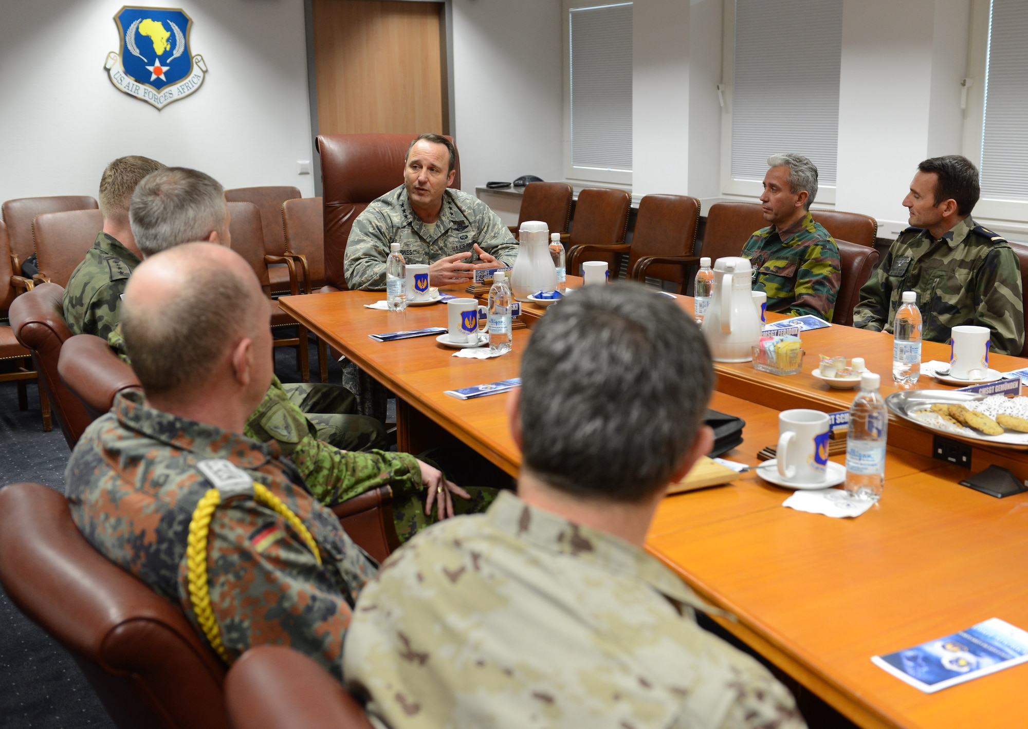 RAMSTEIN AIR BASE, Germany -- Lt. Gen. Tom Jones, U.S. Air Forces in Europe-AIr Forces Africa vice commander, meets with 10 senior non-commissioned officers from eight nations inside USAFE-AFAFRICA Headquarters here Feb. 18, 2014. The international NCOs met with Jones as part of an office call during the four day Kaiserslautern Military Community First Sergeant Council's Additional Duty First Sergeant Symposium.  (U.S. Air Force Photo by Tech. Sgt. James M. Hodgman) 
