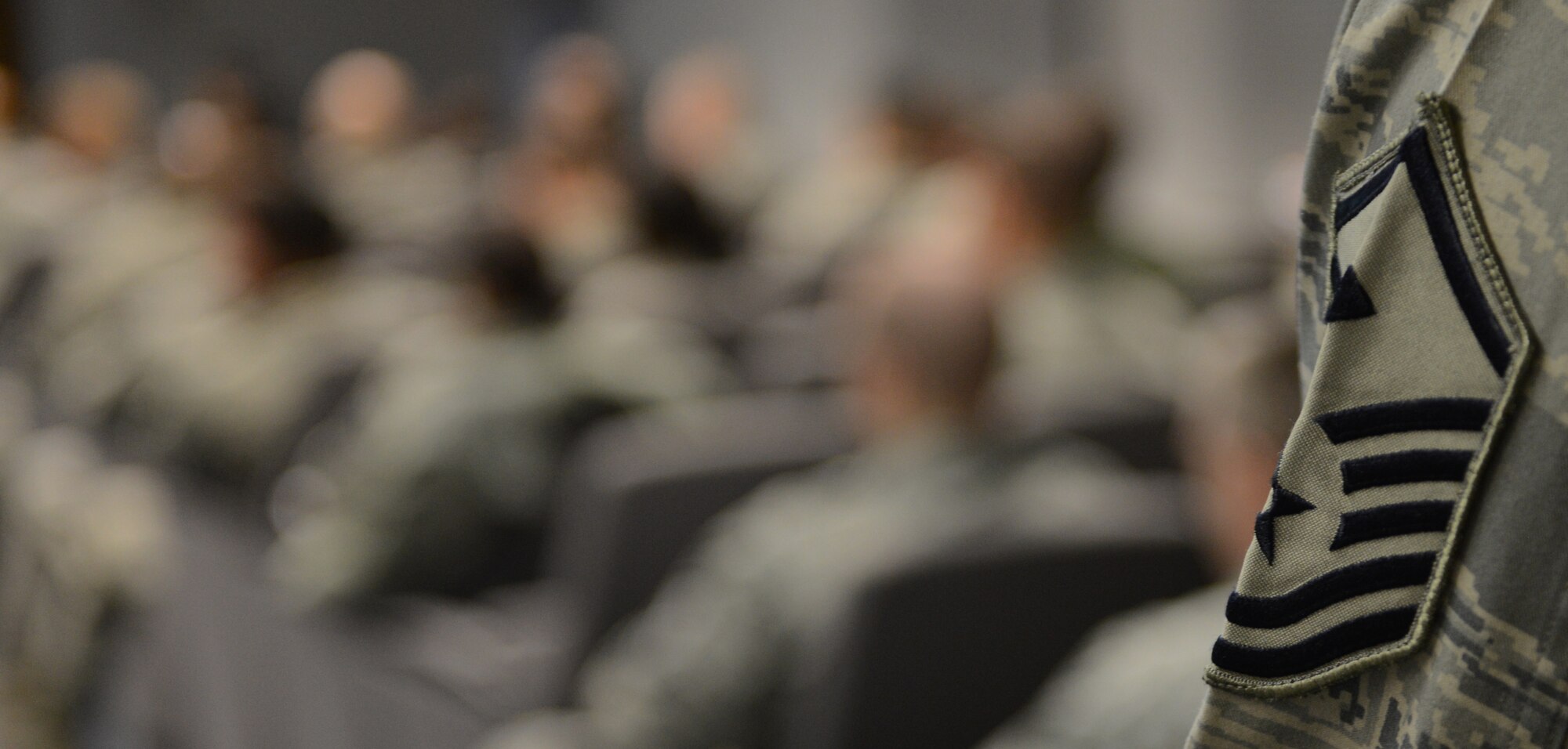KAPAUN AIR STATION, Germany -- More than 120 students listen to a presentation about the responsibilities of a U.S. Air Force first sergeant during the Kaiserslautern Military Community First Sergeant Council's Additional Duty First Sergeant Symposium here Feb. 18, 2014. The symposium featured international attendees for the first time in its history and covered many key roles and responsibilities of the first sergeant position.  (U.S. Air Force Photo by Tech. Sgt. James M. Hodgman) 