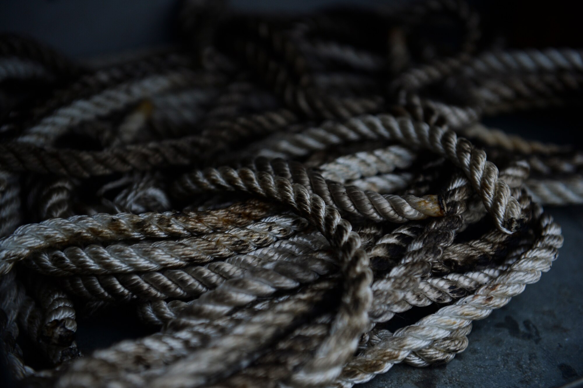 Bundles of ropes are displayed inside a truck on the runway Feb. 18, 2014, at Spangdahlem Air Base, Germany. Members of the 52nd Civil Engineer Squadron electrical power production barrier maintenance shop uses the rope to safely tie down the barrier cables on the runway. (U.S. Air Force photo by Senior Airman Rusty Frank/Released)