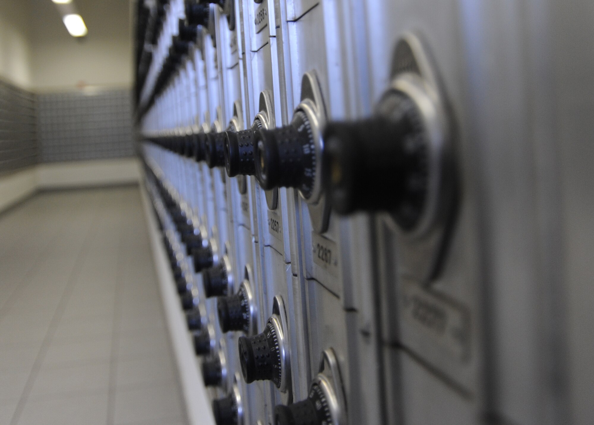 Mail boxes line the wall at the post office on Spangdahlem Air Base, Germany, Feb. 19, 2014. The Spangdahlem postal team received information that possible wet mail may arrive from the U.S. due to bad weather. Customers who receive wet mail can visit the post office customer service for information on how to file a claim. (U.S. Air Force photo by Airman 1st Class Dylan Nuckolls/Released) 