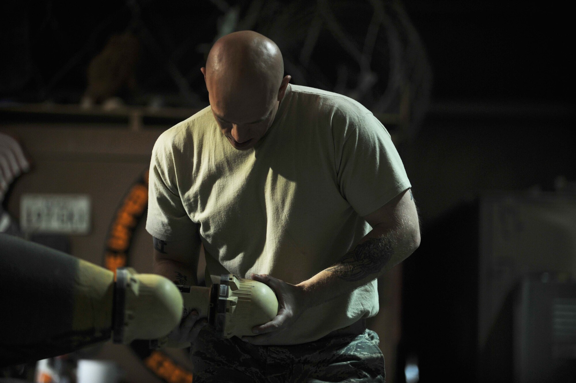 Staff Sgt. Andrew Hester performs an inspection on a proximity sensor (DSU-33) during a six-month Assembled Munitions Serviceability Inspection on a Joint Direct Attack Munition. AMSIs are conducted to ensure all munitions components are serviceable and within the service life dates. The JDAMs are built and loaded on B-1B Lancers that support Operation Enduring Freedom. Hester is a 379th Expeditionary Maintenance Squadron conventional munitions maintenance inspector deployed from Ellsworth Air Force Base, S.D., and a Grand Forks, N.D., native. (U.S. Air Force photo by Master Sgt. David Miller)