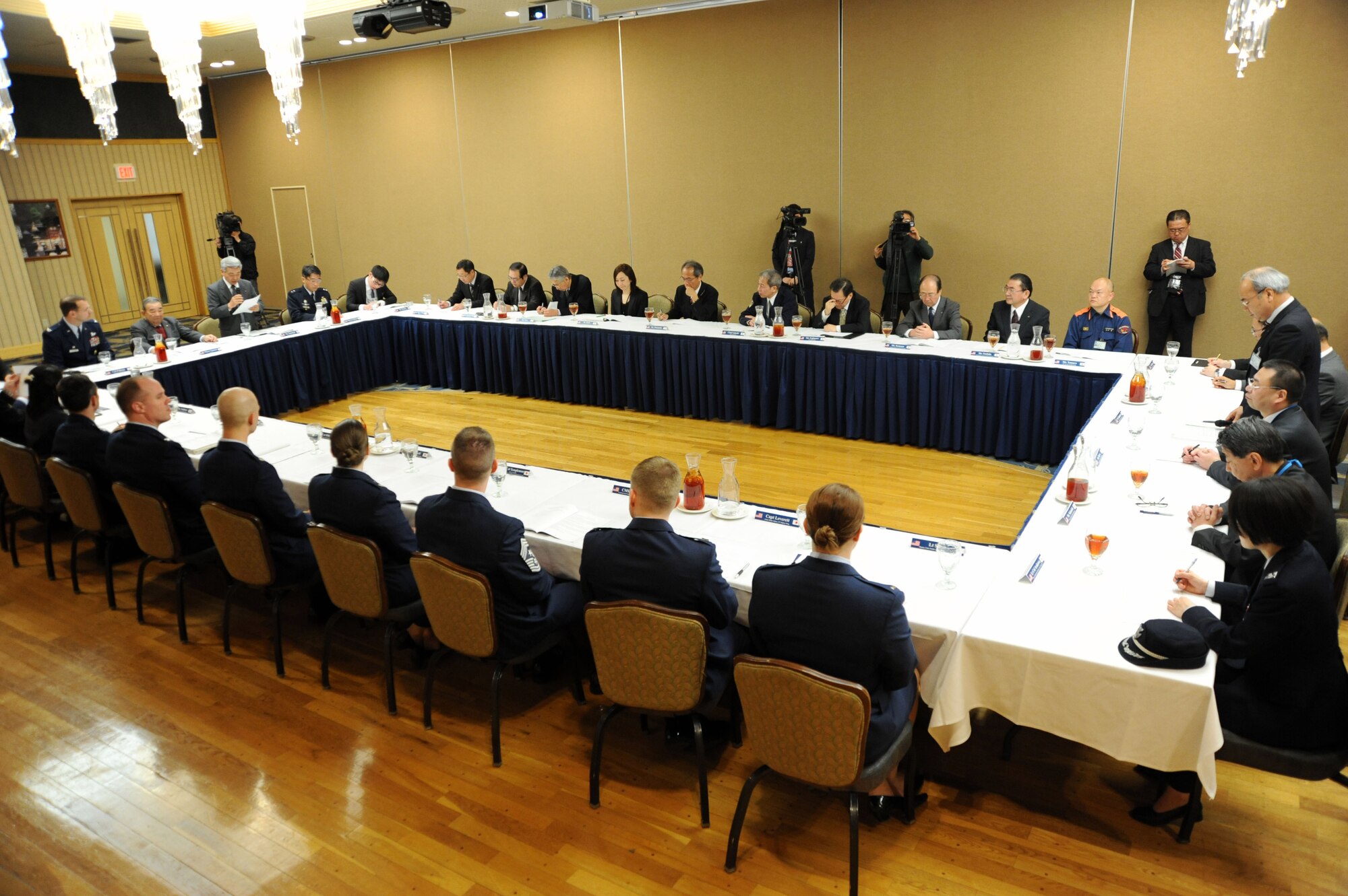 Members of the 35th Fighter Wing and the Misawa City Council gather together for an annual Community Relations Advisory Council meeting at Misawa Air Base, Japan, Feb. 14, 2014. The meetings are designed to discuss present issues between the community and military, and this year’s meeting recognized the strong relationship between the two organizations and planned bilateral engagements for the upcoming year. (U.S. Air Force photo/Senior Airman Derek VanHorn)