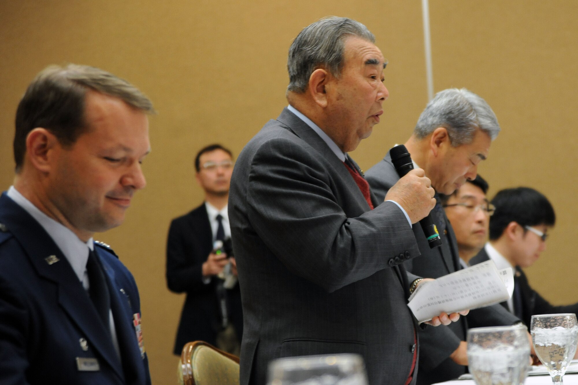 Kazumasa Taneichi, Misawa City mayor, addresses members of the 35th Fighter Wing and Misawa City Council members during an annual Community Relations Advisory Council meeting at Misawa Air Base, Japan, Feb. 21, 2014. Taneichi thanked base members for their close friendship and lauded their support for events between the military and community. (U.S. Air Force photo/Senior Airman Derek VanHorn)