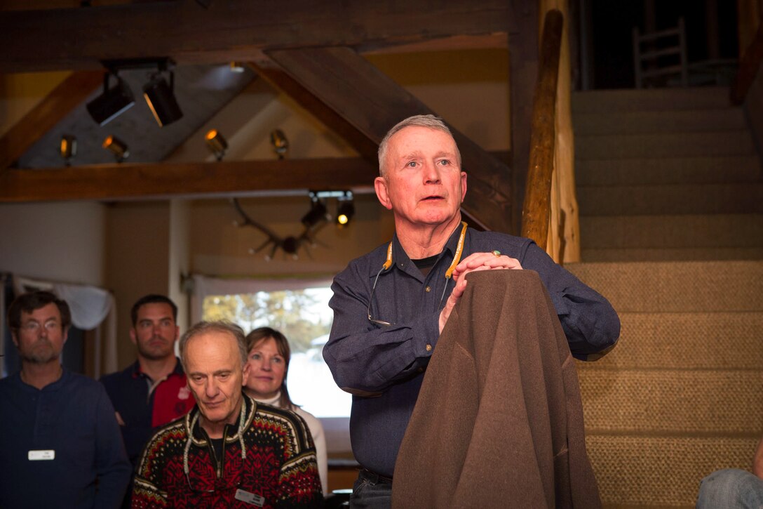 Retired Marine Corps Col. Eric Hastings, founder of Warriors and Quiet Waters Foundation, speaks to staff, volunteers and participants at the end of a weeklong ski experience for combat-wounded veterans at Big Sky Ski Resort, Mont., Feb. 14, 2014.