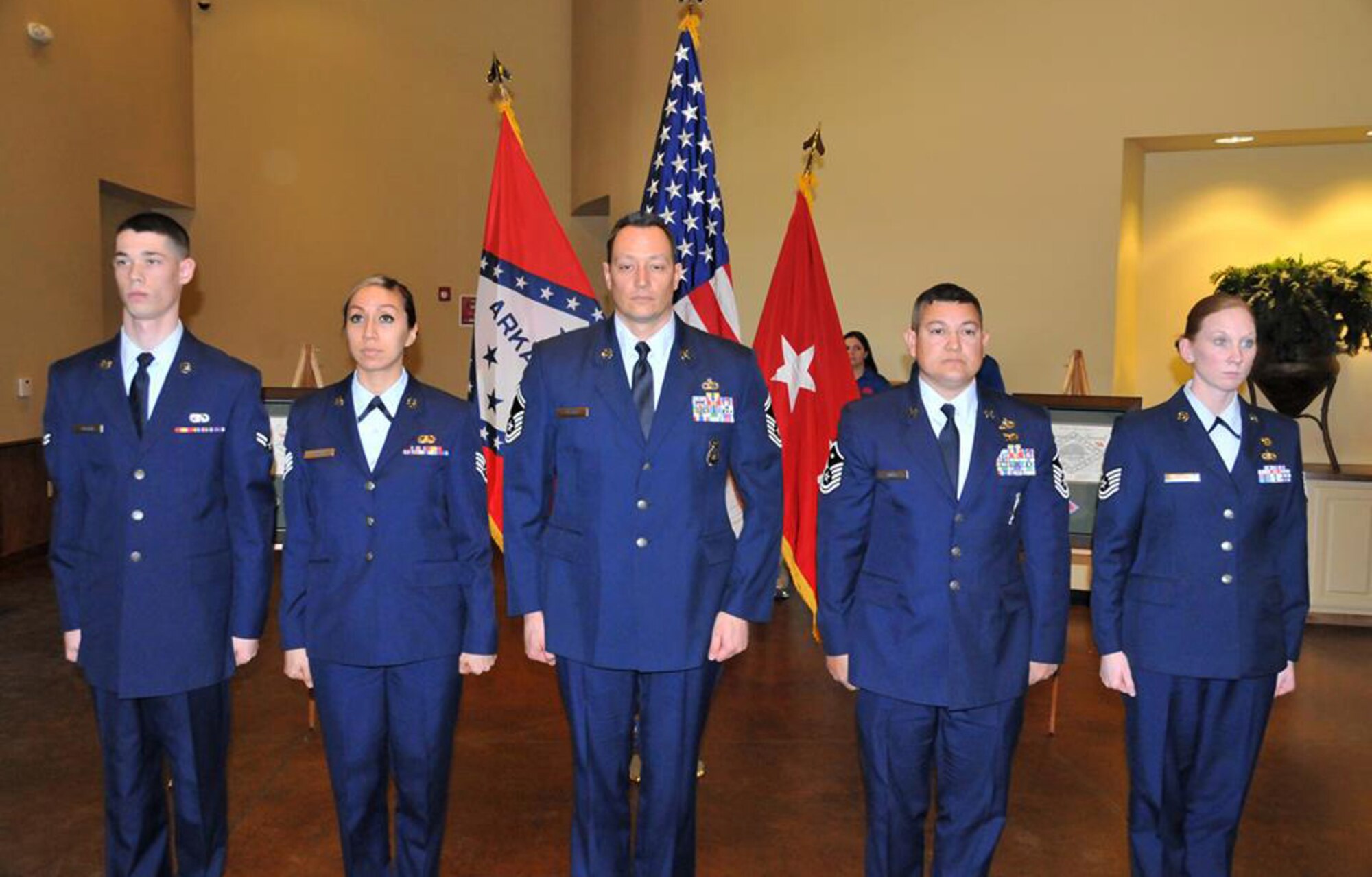 Staff Sgt. Julie Darrough (second from left) of the 188th Communications Flight earned the Arkansas Air National Guard Noncommissioned Officer of the Year and Master Sgt. Brian Anible (second from right) of the 188th Mission Support Group won Arkansas Air National Guard 1st Sergeant of the Year. The winners were recognized during a presentation Feb. 22 at Camp Joseph T. Robinson, Ark. Also pictured from left are Airman of the Year, Airman First Class Trevor Grooms of the 123rd Intelligence Squadron; Senior Noncommissioned Officer of the Year, Senior Master Sgt. Matthew Pfleger of the 189th Security Forces Squadron; and Honor Guard Member of the Year, Tech Sgt. Amber Brown of Arkansas National Guard Joint Force Headquarters. (Courtesy photo)