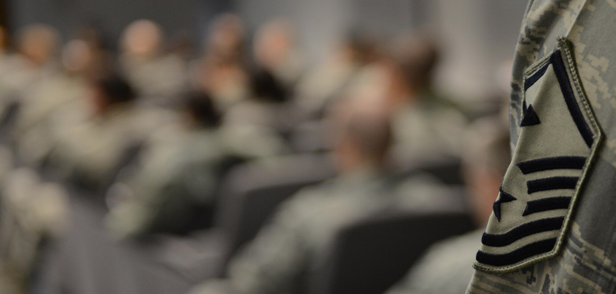 More than 120 students listen to a presentation about the responsibilities of a U.S. Air Force first sergeant during the Kaiserslautern Military Community First Sergeant Council's Additional Duty First Sergeant Symposium here Feb. 18, 2014. The symposium featured international attendees for the first time in its history and covered many key roles and responsibilities of the first sergeant position. (U.S. Air Force Photo/Tech. Sgt. James M. Hodgman) 