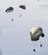 Greek paratroopers prepare for a water landing after jumping out the back of a U.S. Air Force C-130J Super Hercules during Stolen Cerberus, a two-week flying, training deployment designed to incorporate various training methods in order to maintain proficiency during deployed operations and increase interoperability with the Hellenic air force, Feb. 2 to 14, 2014. The mission provided the U.S. and Hellenic air forces a unique opportunity to learn how each service performs airlift operations, improving the joint capabilities of both nations. (U.S. Air Force photo/Staff Sgt. Kris Levasseur)