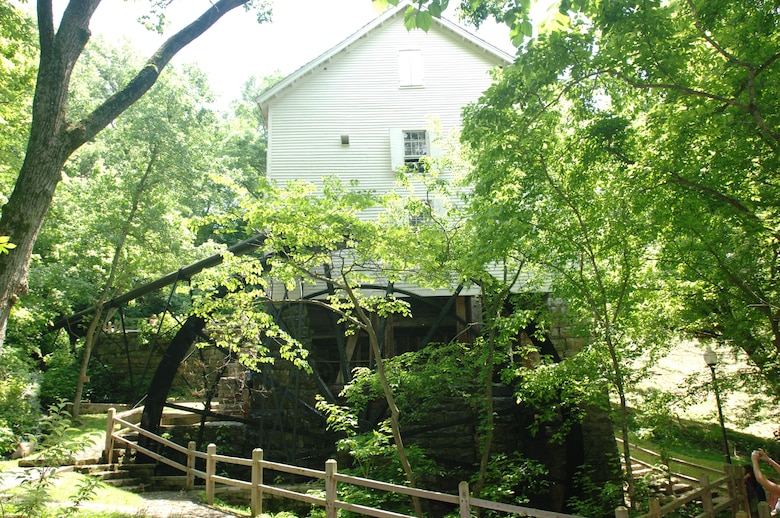 The overshot waterwheel at Mill Springs Mill turns while the mill operates during the 18th Annual Cornbread Festival May 28, 2011.  There was a large turnout of people to see the mill and enjoy the booths and entertainment by scenic Lake Cumberland.