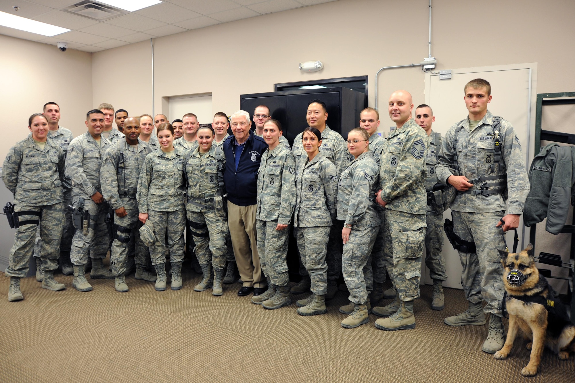 Retired Chief Master Sgt. of the Air Force Robert Gaylor stands with 799th Security Forces Squadron members Feb. 7, 2014, during a visit to the 799th Air Base Group. Gaylor was assigned to the security police career field before becoming Chief Master Sergeant of the Air Force. (U.S. Air Force photo by 1st Lt S.S.)