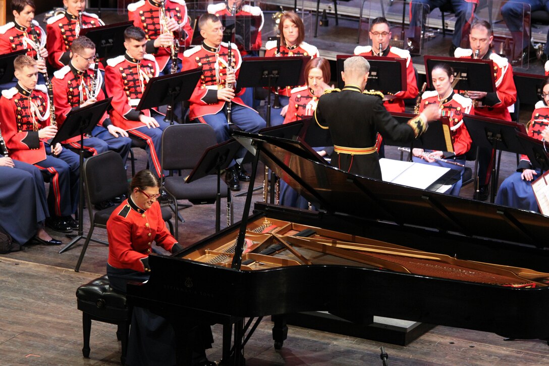 On Feb. 23, 2014, the Marine Band performed a concert titled "Themes and Variations," at the Rachel M. Schlesigner Concert Hall at Northern Virginia Community College in Alexandria, Va. Conducted by Col. Michael J. Colburn, the concert featured pianist Gunnery Sgt. AnnaMaria Mottola performing George Gershwin's Variations on "I Got Rhythm." (U.S. Marine Corps photo by Master Sgt. Kristin duBois/released)