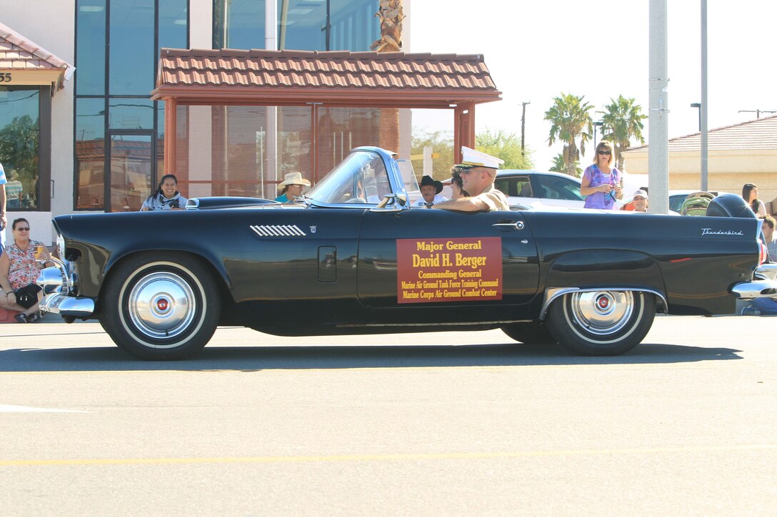 Maj. Gen. David H. Berger, Combat Center commanding general, drives a car down Adobe Road during the 77th annual Pioneer Days Parade Oct. 19, 2013.


