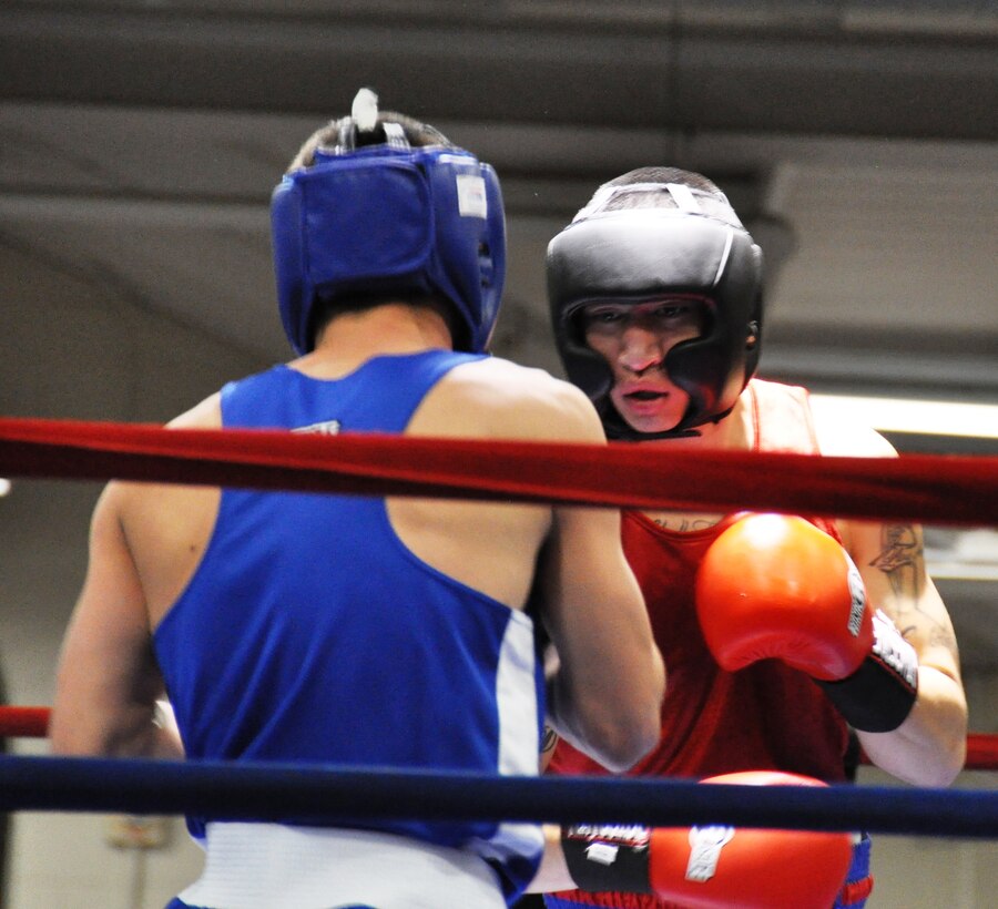 Senior Airman Dustin Southichack of the 433rd Civil Engineering Squadron, squares off against John Van Meter of the Tree City Boxing Club from Uvalde, Texas at the San Antonio Regional Golden Gloves on Feb. 20 at Woodlawn Gym.  Southichack, a light welterweight, is the only Reservist on the All Air Force boxing Team. (U.S. Air Force photo by Tech Sgt. Carlos J. Trevino)