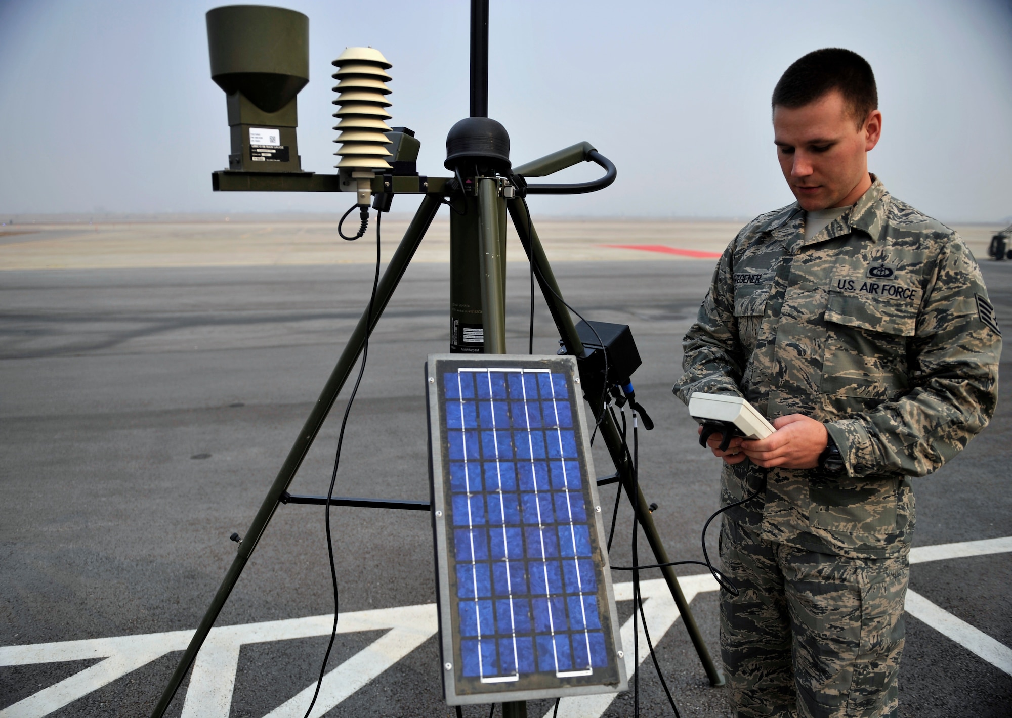 Staff Sgt. Brandon Wegener, 51st Operations Support Squadron weather forecaster, views information from a tactical meteorological observing system at Osan Air Base, Republic of Korea, Feb. 24, 2014. Wegener is this week’s Airman Spotlight winner. (U.S. Air Force photo/Senior Airman Siuta B. Ika)