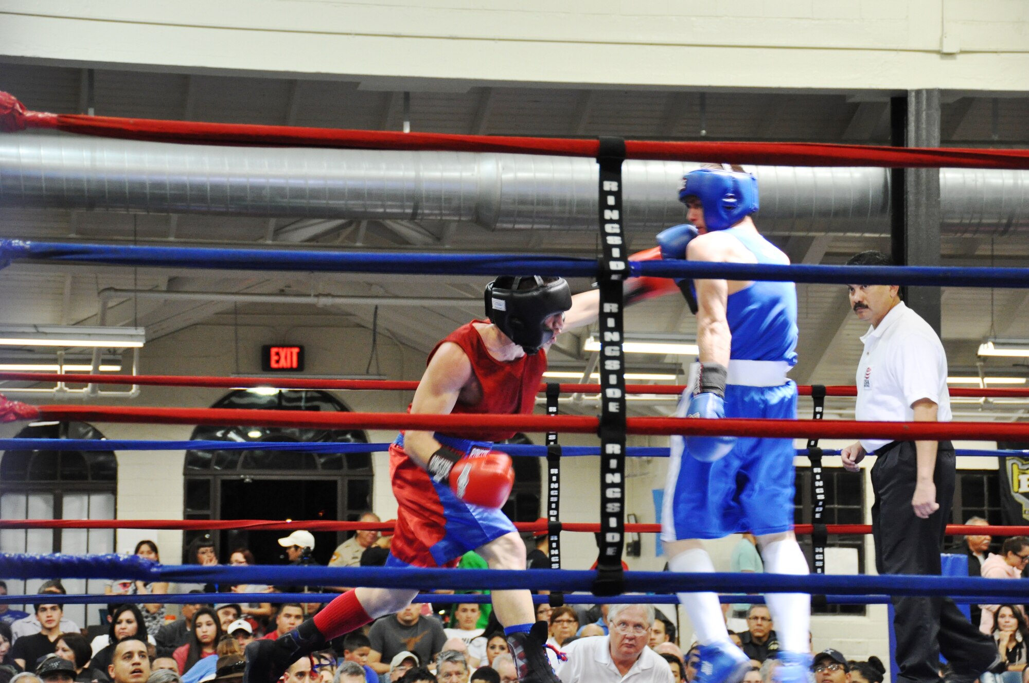 Senior Airman Dustin Southichack of the 433rd Civil Engineering Squadron, lands a devastating left on John Van Meter of the Tree City Boxing Club from Uvalde, Texas at the San Antonio Regional Golden Gloves on Feb. 20 at Woodlawn Gym.  Southichack, a light welterweight, is the only Reservist on the All Air Force boxing Team. (U.S. Air Force photo by Tech Sgt. Carlos J. Trevino)