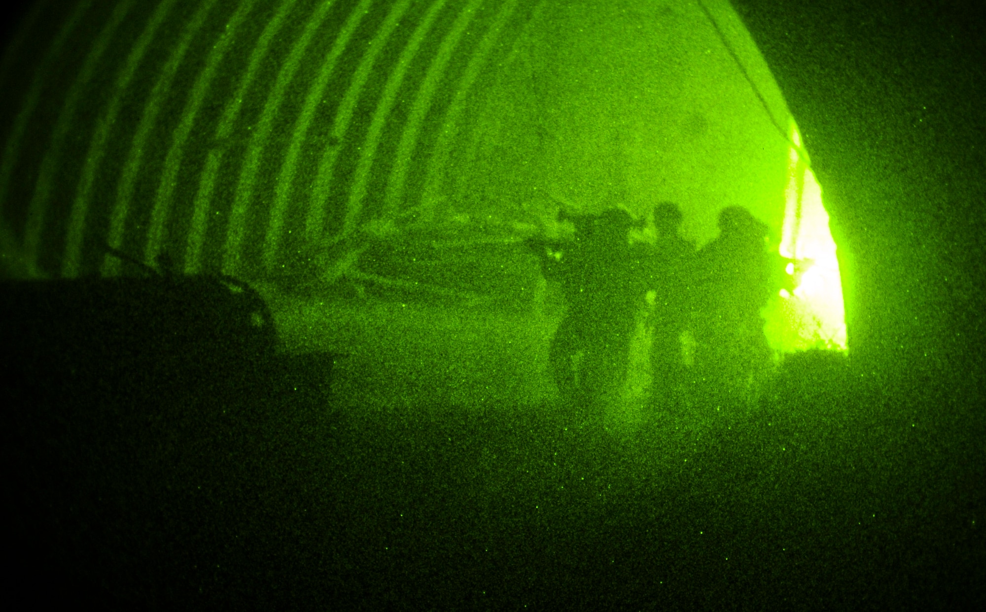 Soldiers of the 7th Special Forces Group clear a hardened aircraft shelter during a night exercise on Eglin Range, Fla., Feb. 20, 2014. Simulated opposition forces created a perimeter around the facility, which the soldiers breached. (U.S. Air Force photo/Senior Airman Michelle Vickers) 