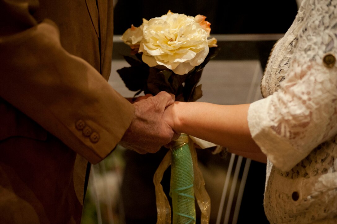 A marriage vow renewal ceremony took place at Sheppard Feb. 22. The ceremony was meant to encourage more intimacy and understanding among the couples. (U.S. Air Force photo by Airman 1st Class Jelani Gibson) 
