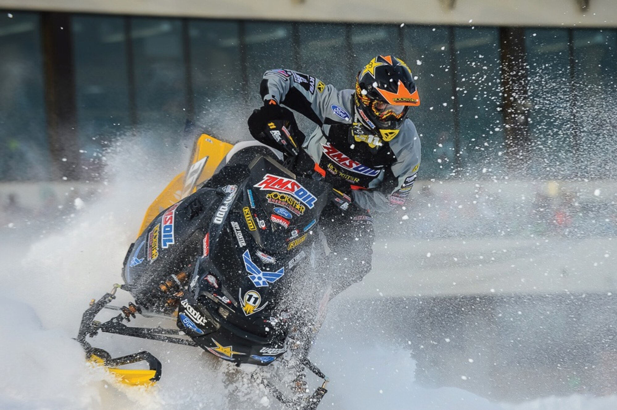 Tim Tremblay, Canterbury Park's Traxxas Snocross race contestant, competes in Shakopee, Minn., Jan. 3. The snocross event attracted more than 260,000 fans through a live broadcast online. The Air Force sponsors Tremblay’s number 11 snowmobile. He finished fifth in the final results for round six of the event. (Courtesy photo)