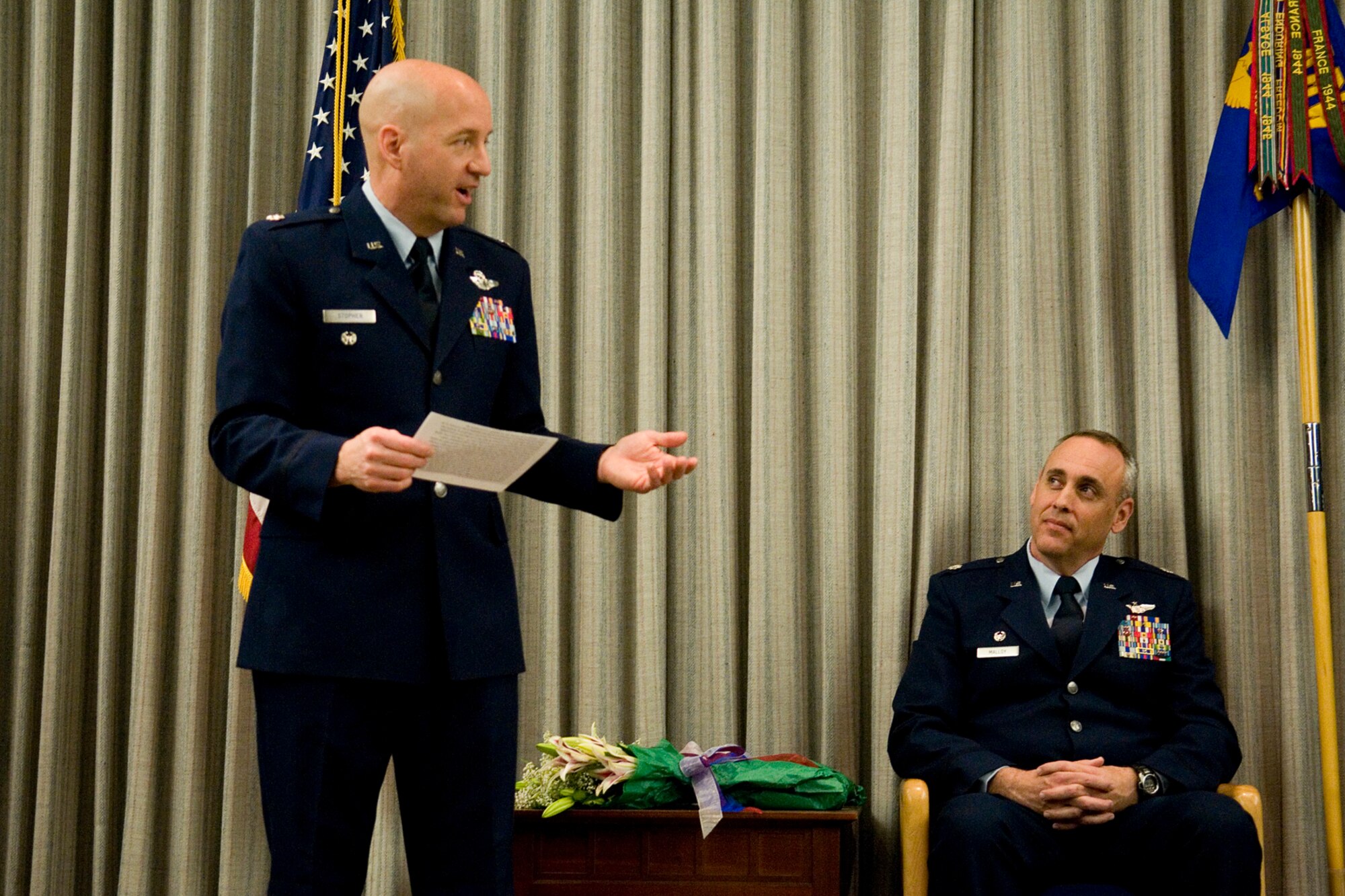 Lt. Col. Brian Stopher, former 74th Air Refueling Squadron commander, speaks to guests at a change of command ceremony at Grissom Air Reserve, Ind., Base Feb. 8, 2014. Lt. Col. James West was given command of the 74th ARS during the ceremony. (U.S. Air Force photo/Staff Sgt. Andrew McLaughlin)
