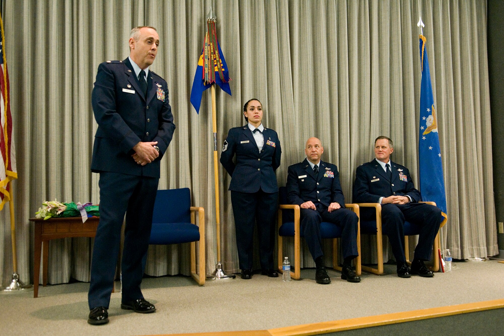 Lt. Col. Gerard Malloy, 434th Operations Group commander, speaks to guests at a change of command ceremony at Grissom Air Reserve Base, Ind., Feb. 8, 2014. Lt. Col. James West was given command of the 74th Air Refueling Squadron during the ceremony. (U.S. Air Force photo/Staff Sgt. Andrew McLaughlin)
