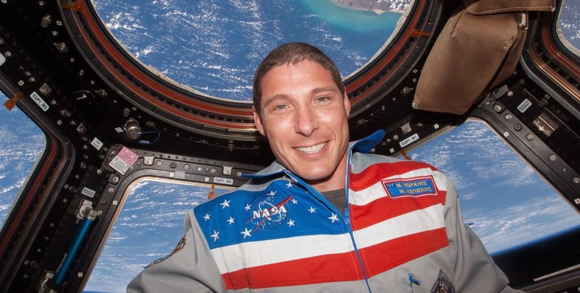 NASA astronaut Michael Hopkins taken from the cupola of the International Space Station on Oct. 15, 2013. “Can't believe this is really me from the Cupola and that I've been in space for almost three weeks now!” Hopkins tweeted.  (Courtesy photo)