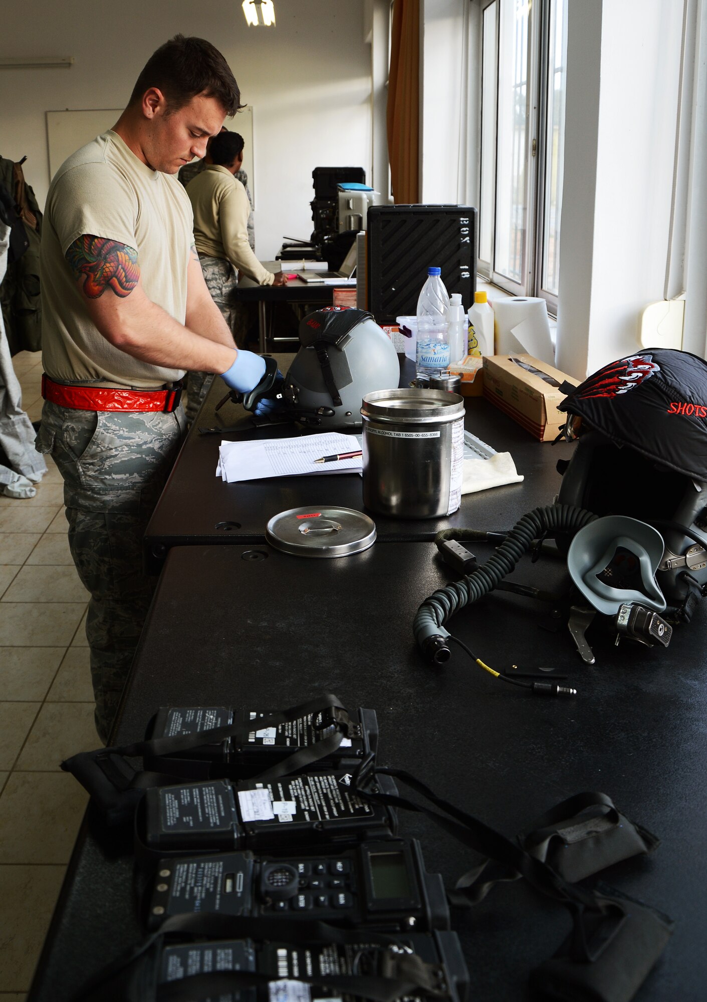 Staff Sgt. William Novak, 494th Expeditionary Fighter Squadron Aircrew Flight Equipment supervisor, sanitizes an F-15E Strike Eagle helmet at Souda Bay, Greece, following a sortie supporting a U.S. Air Forces in Europe flying training deployment on the island of Crete Feb. 24, 2014. The 494th EFS was deployed by the 48th Fighter Wing at Royal Air Force Lakenheath, England, to train with the Hellenic Air Force to strengthen military-to-military relationships and increase NATO interoperability. (U.S. Air Force photo by Staff Sgt. Thomas Trower)