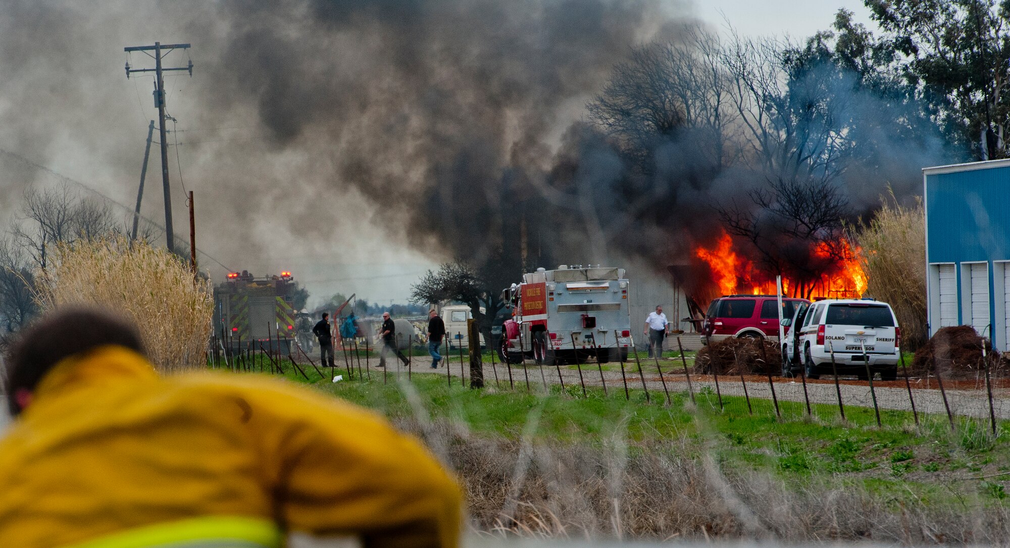 Travis Air Force Base firefighters and local firefighters respond to a fire Feb. 18 at a burned-down trailer in Vacaville, Calif. (U.S. Air Force photo/Tech. Sgt. Matthew Hannen)
