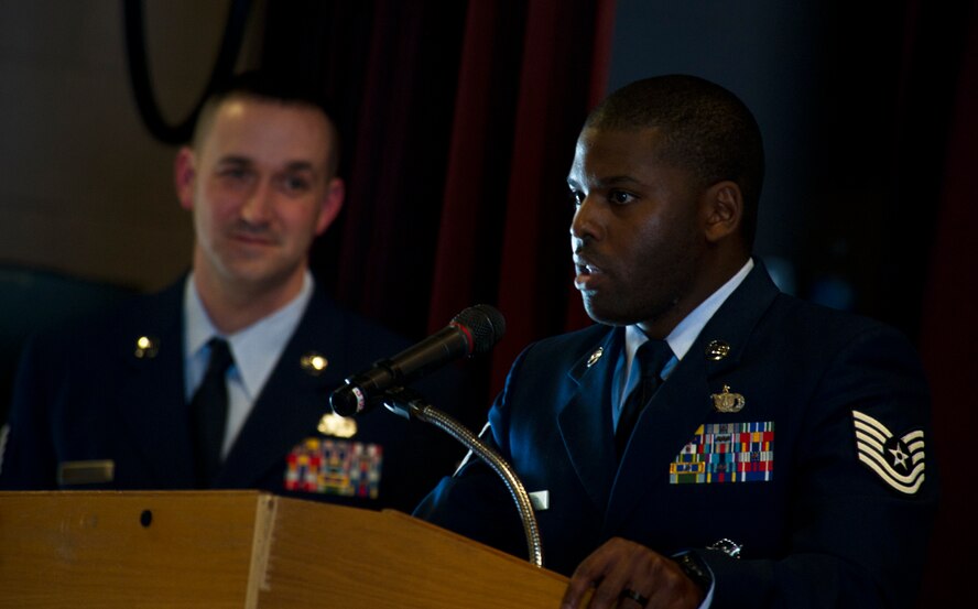 Tech. Sgt. Theo Toliver, 5th Security Forces Squadron military working dog handler says a few words about MWD Ben during his retirement ceremony at Minot Air Force Base, N.D., Feb. 19, 2013. “Ben is the real deal,” were the words that stood out to Toliver when he looked at the file on his new canine companion upon arriving at Minot AFB in 2010.  (U.S. Air Force photo/Senior Airman Brittany Y. Auld)                                                                       