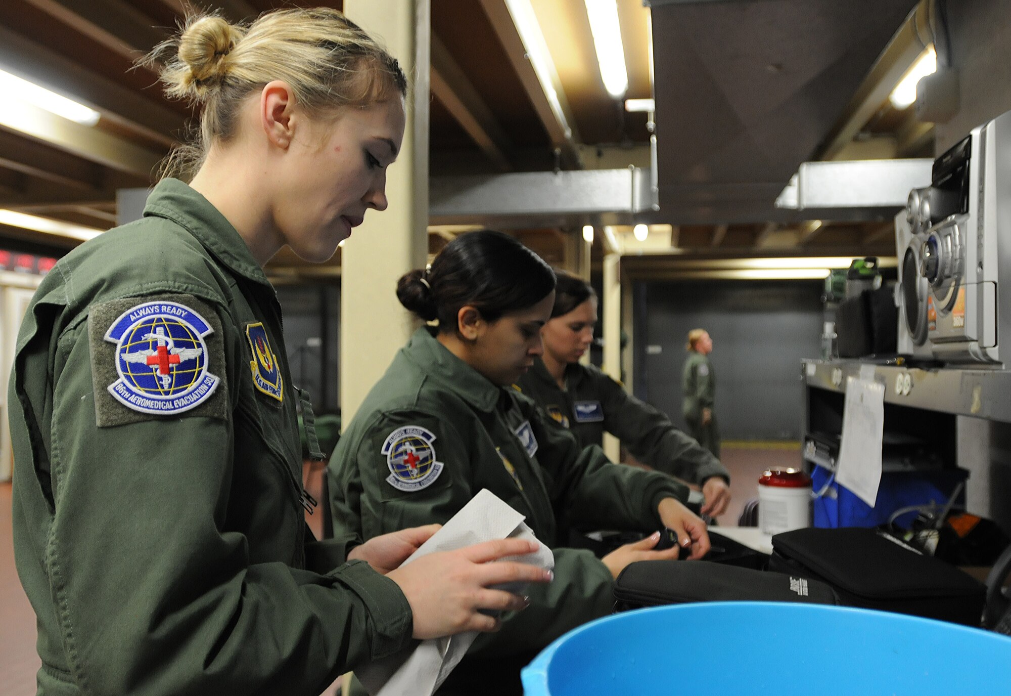 Members of the 86th Aeromedical Evacuation Squadron clean and inspect flight medical equipment Feb. 20, 2014, Ramstein Air Base, Germany. The medical equipment is used during incoming and outgoing flights to ensure the proper medical treatment is used for patients in need. (U.S. Air Force photo/Airman 1st Class Holly Mansfield)