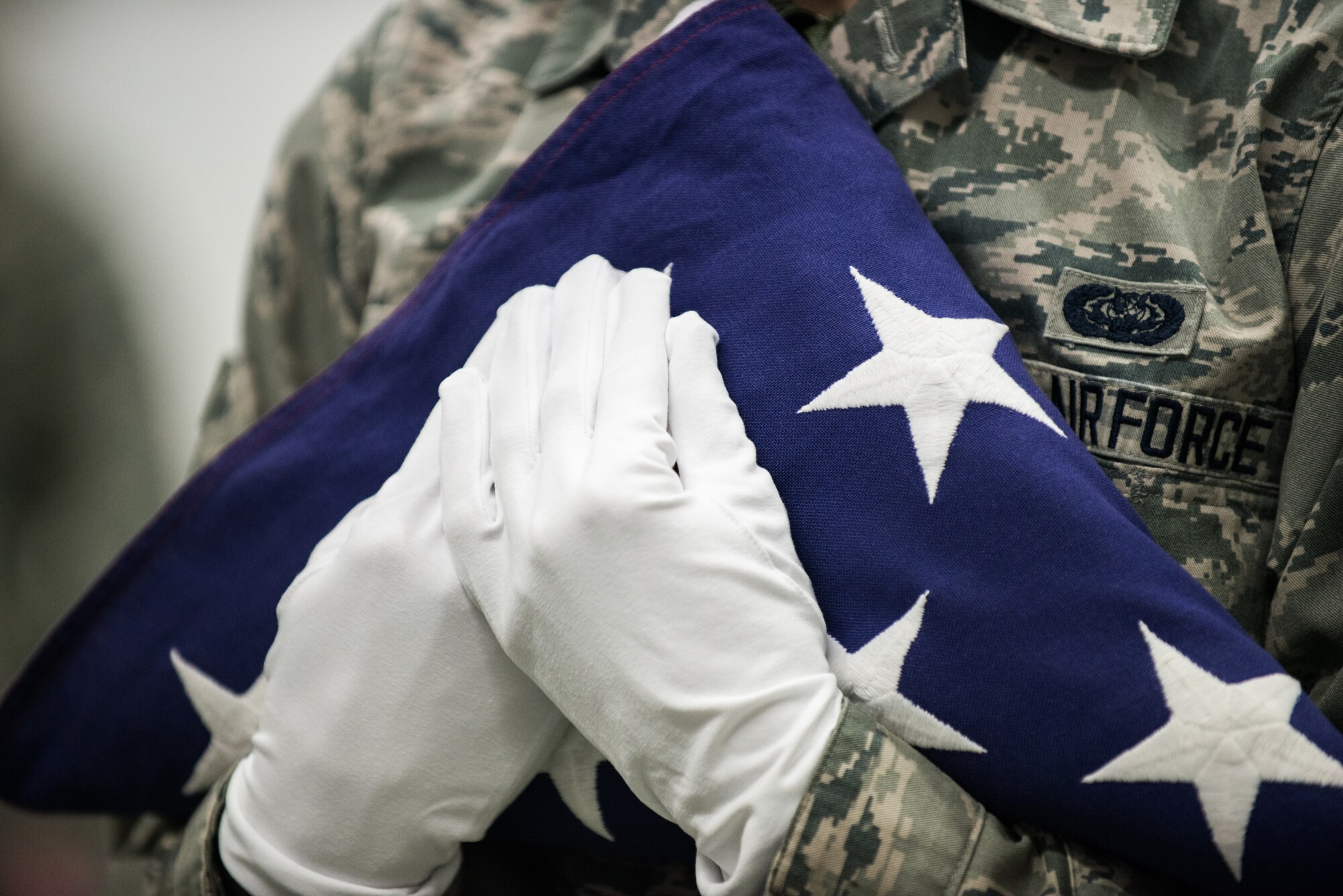 Airman 1st Class Drake Griffin, 86th Communications Squadron honor guardsman, holds an American flag during practice Feb. 19, 2014, Ramstein Air Base, Germany. The base honor guard trains constantly to perfect their skills and maintain readiness for ceremonies. (U.S. Air Force photo/Senior Airman Jonathan Stefanko)