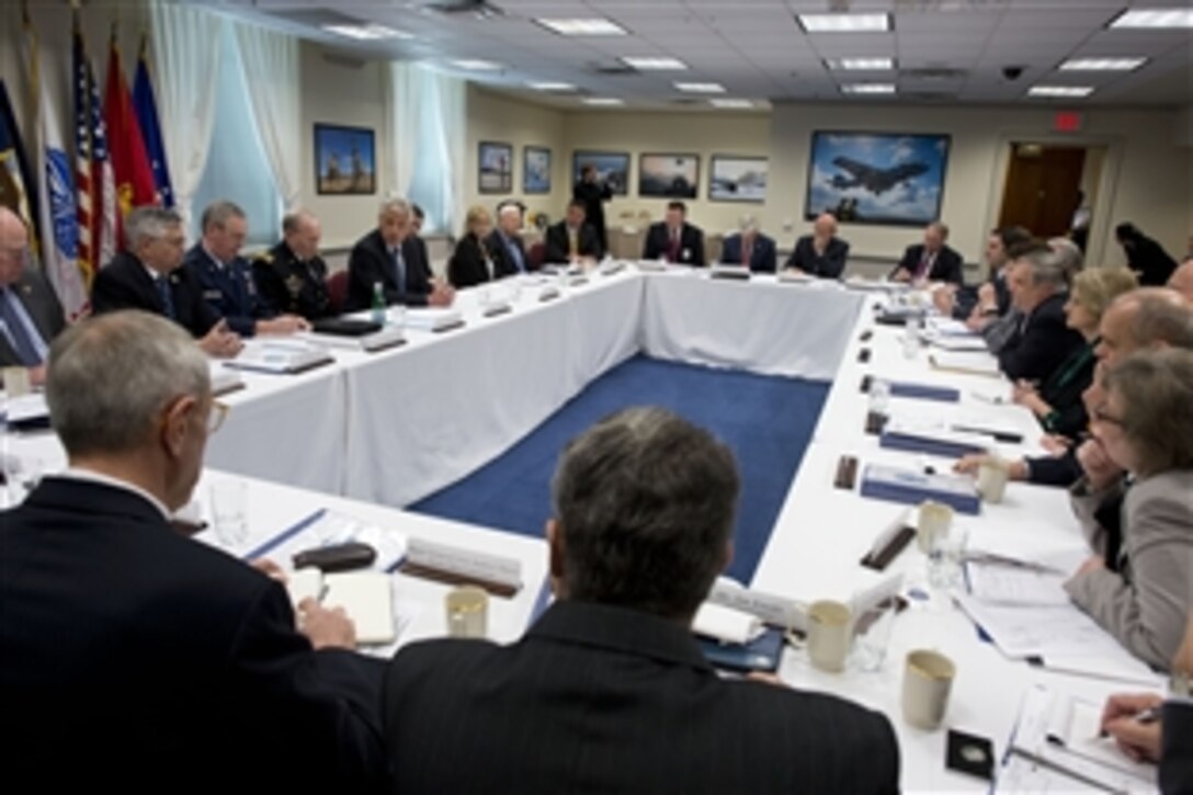 Defense Secretary Chuck Hagel, center left, meets with members of veteran and military service organizations for a round-table discussion at the Pentagon, Feb. 24, 2014. Army Gen. Martin E. Dempsey, chairman of the Joint Chiefs of Staff, fourth from left, participated in the meeting.