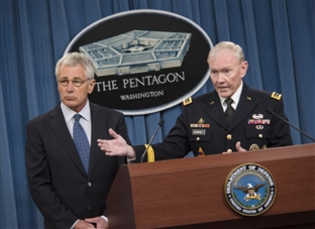 Army Gen. Martin E. Dempsey, chairman of the Joint Chiefs of Staff, and Defense Secretary Chuck Hagel brief reporters on the fiscal year 2015 defense budget proposal at the Pentagon, Feb. 24, 2014. 