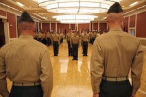 Lt. Col. Kevin G. Collins (left), the outgoing commanding officer and Lt. Col. Daniel H. Coleman (right), the incoming CO of Combat Logistics Battalion 26, Combat Logistics Regiment 27, 2nd Marine Logistics Group, stand at attention while the ‘Marine Corps Hymn’ is playing during a change of command ceremony at Marston Pavilion aboard Camp Lejeune, N.C., Feb. 21, 2014. A change of command ceremony is passing the total accountability, authority and responsibility of the battalion between two high ranking officers. 