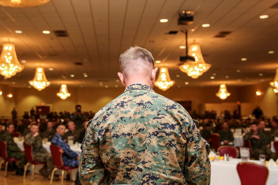 U.S. Marine Lt. Col. John R. O’Neal, commanding officer, 15th Marine Expeditionary Unit, addresses a crowd of Marines and sailors and soldiers with the Japan Ground Self-Defense Force at the closing ceremony for Exercise Iron Fist 2014 aboard Camp Pendleton, Calif., Feb. 24, 2014. Iron Fist is an amphibious exercise that brings together Marines and sailors from the 15th MEU, other I Marine Expeditionary Force units, and soldiers from the JGSDF, to promote military interoperability and hone individual and small-unit skills through challenging, complex and realistic training. (U.S. Marine Corps photo by Cpl. Emmanuel Ramos/Released)