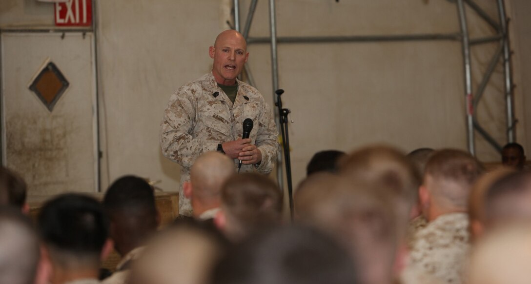 Sergeant Maj. Micheal P. Barrett, sergeant major of the Marine Corps, speaks to Marines and sailors aboard Camp Leatherneck, Helmand province, Afghanistan, during a town hall meeting held Feb. 18, 2014.  After Gen. James F. Amos, commandant of the Marine Corps, spoke with the service members about the direction in which the Marine Corps is headed and the reawakening of the Corps, Sgt. Maj. Barrett expressed his gratitude for the Marines and everything they have been doing in Afghanistan.