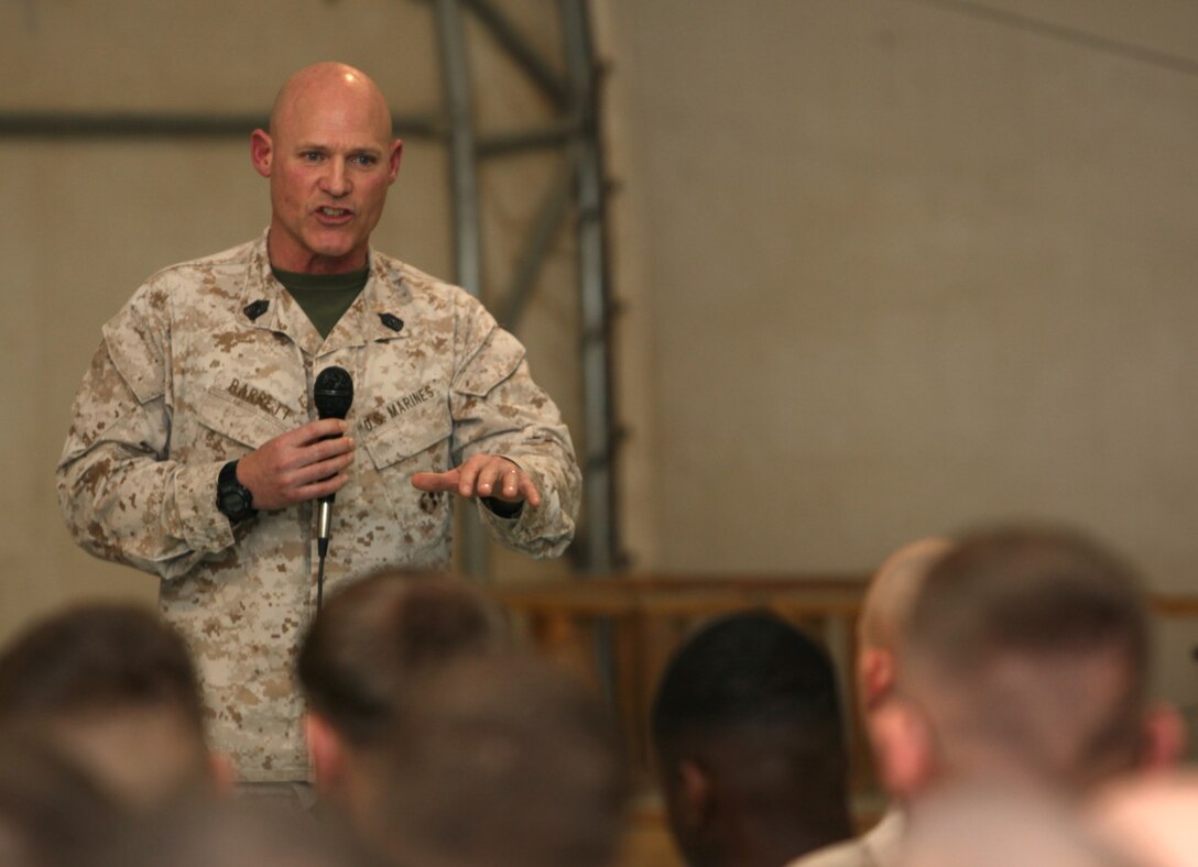 Sergeant Maj. Micheal P. Barrett, sergeant major of the Marine Corps, speaks to Marines and sailors aboard Camp Leatherneck, Helmand province, Afghanistan, during a town hall meeting held Feb. 18, 2014. After Gen. James F. Amos, commandant of the Marine Corps, spoke with the service members about the direction in which the Marine Corps is headed and the reawakening of the Corps, Sgt. Maj. Barrett expressed his gratitude for the Marines and everything they have been doing in Afghanistan.