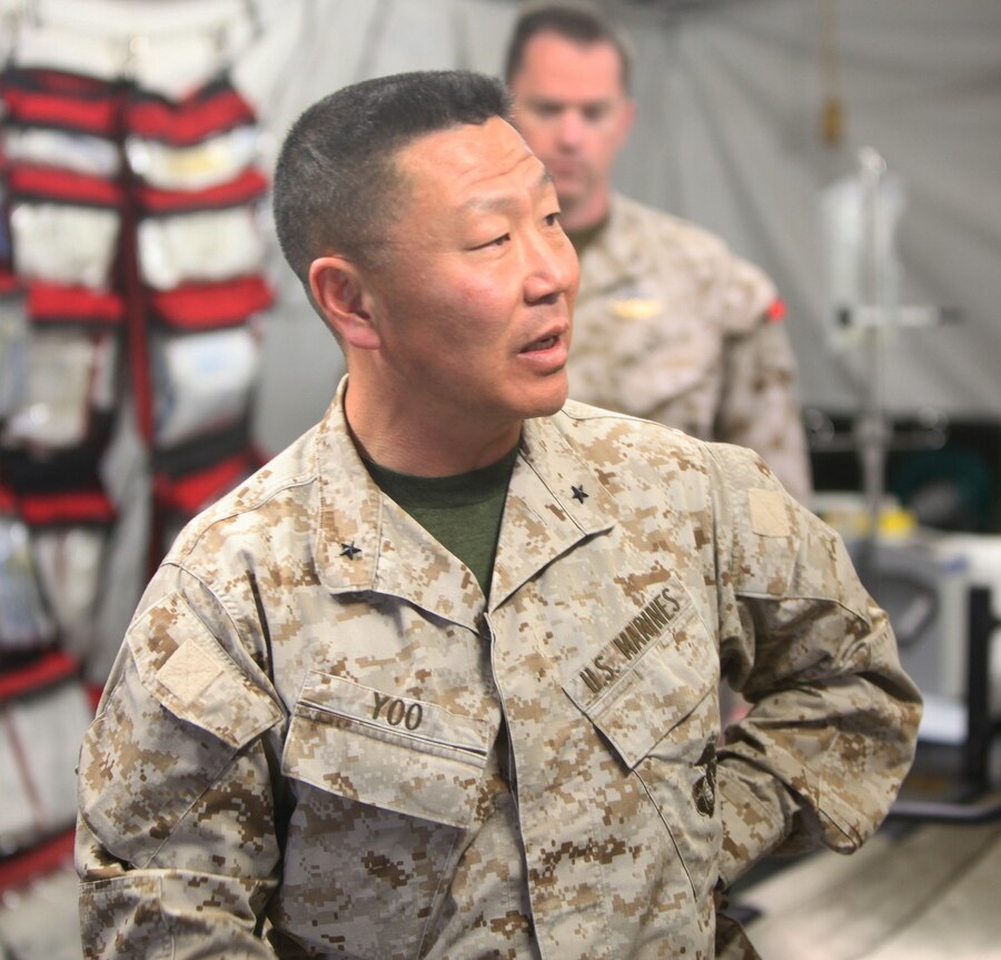 Brigadier General Daniel D. Yoo, commanding general of Regional Command (Southwest), addresses life saving techniques with emergency physicians, nurses, and independent duty corpsmen from Alpha Surgical Company, Combat Logistics Battalion 7, aboard Camp Leatherneck, Helmand province, Afghanistan, Feb. 15, 2014. Yoo expressed how impressed he was with the skills and confidence of the emergency surgeons, nurses, independent duty corpsmen and field medic corpsmen operating aboard Camp Leatherneck and throughout Helmand province. (U.S. Marine Corps photo by Cpl. Cody Haas/ Released)