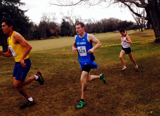 Senior Airman Derek Gwin, 9th Reconnaissance Wing civil law paralegal, competes at the 2014 Armed Forces Cross Country Championship on Feb. 15, 2014, in Boulder, Colo. The men’s Air Force team finished 2nd in the competition. (Courtesy photo)
