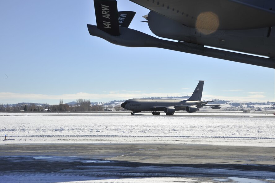 A KC-135 Stratotanker assigned to the 92nd Air Refueling Wing at Fairchild Air Force Base, Wash., taxis on the runway Feb. 25, 2014. After nearly a year of planning, the wing's Stratotankers and crews returned home from Manas for the last time to a commemoration and welcoming home ceremony. (U.S. Air Force photo/Senior Airman Mary O'Dell)