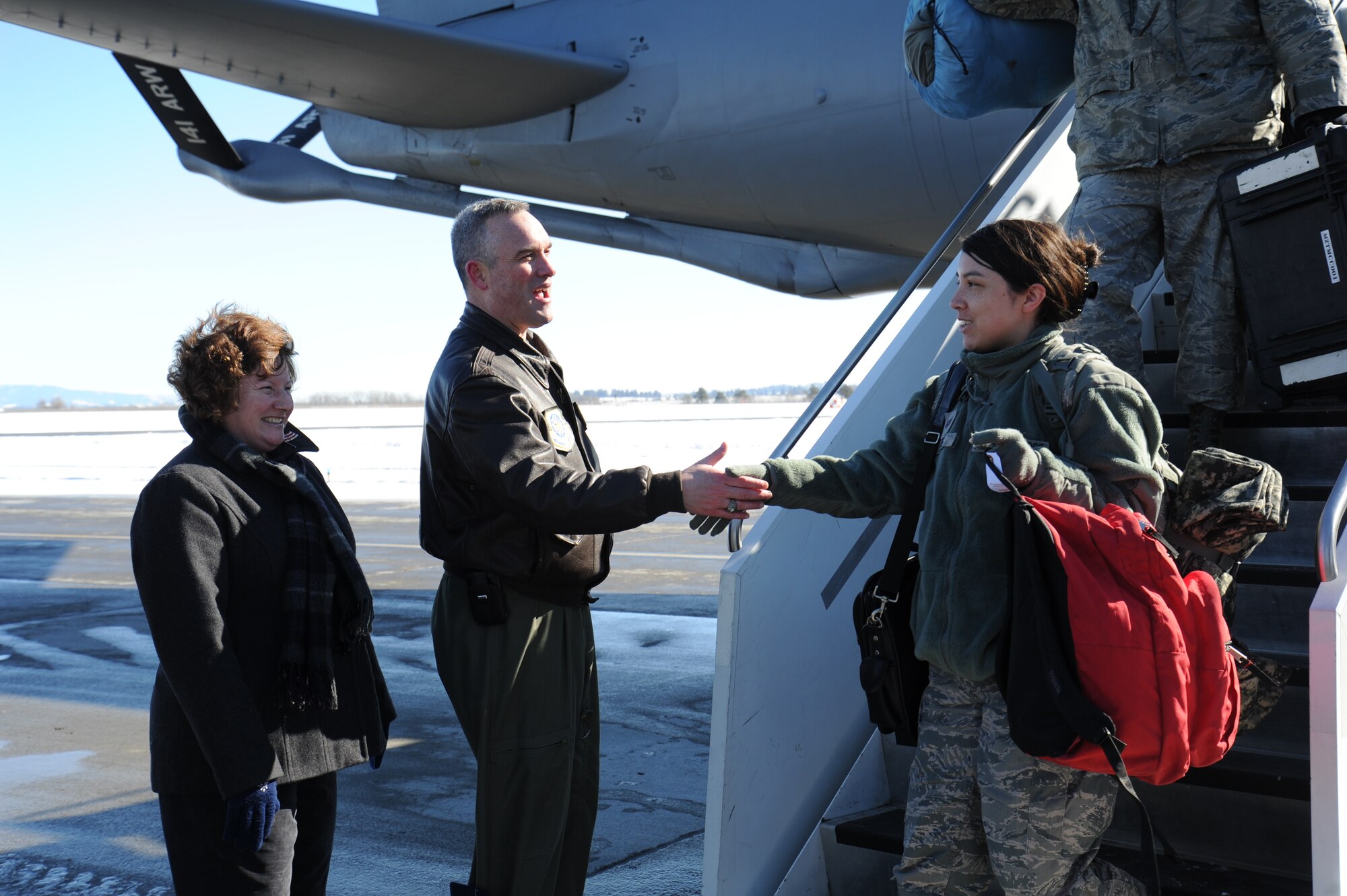 Airmen from the 92nd Air Refueling Wing and three KC-135 Stratotankers return home from the Transit Center at Manas, Kyrgystan, for the last time at Fairchild Air Force Base, Wash., Feb. 25, 2014. While supporting expeditionary operations at Manas, the 92nd ARW flew more than 20,000 sorties in nearly 125,000 hours, offloading some 1,500 pounds of fuel to more than 110,000 U.S. and Coalition airframes during the decade-long partnership. (U.S. Air Force photo by Airman 1st Class Janelle Patiño/Released)