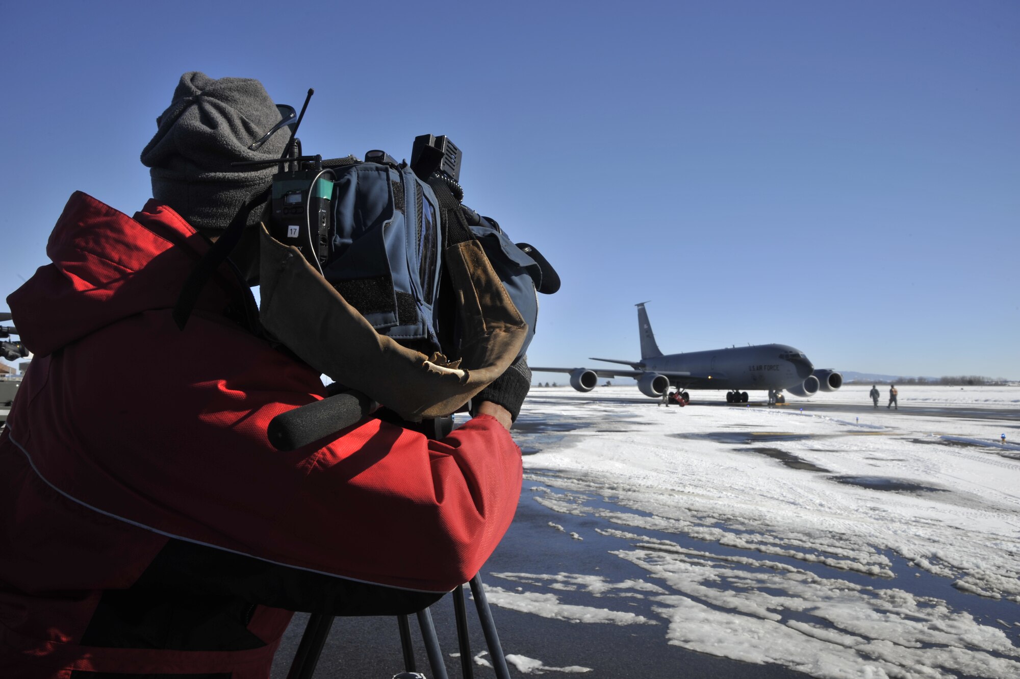 Local media attended a commemoration and welcoming home ceremony at Fairchild Air Force Base, Wash., Feb. 25, 2014. The 92nd Air Refueling Wing's KC-135 Stratotankers and crews returned home from the Transit Center at Manas, Kyrgystan, for the last time. (U.S. Air Force photo by Senior Airman Mary O'Dell/Released)