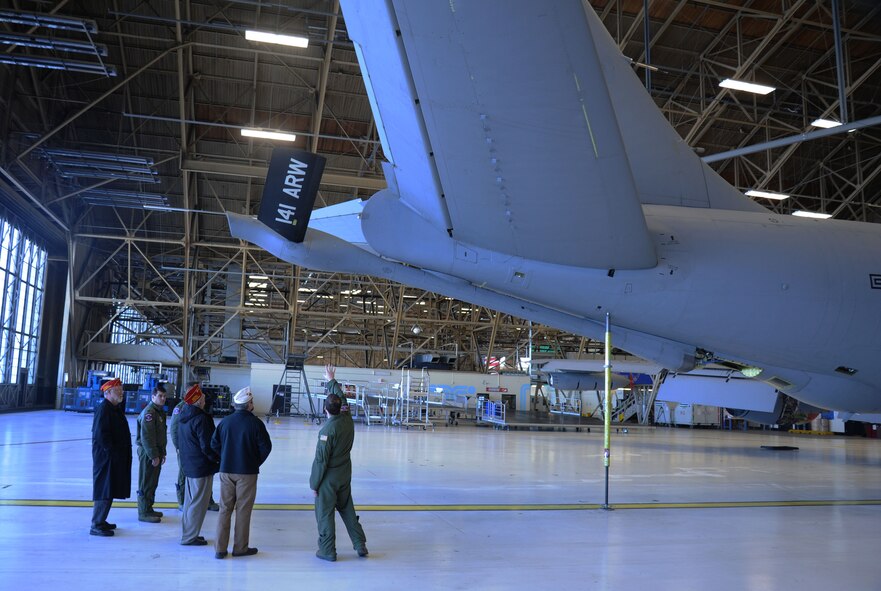 Airmen from the 93rd Air Refueling Squadron explain the exterior of a KC-135 Stratotanker to members of the American Legion at Fairchild Air Force Base, Wash., Feb. 25, 2014.  The American Legion lobbies on behalf of veterans' interests.  (U.S. Air Force photo by Airman 1st Class Sam Fogleman/Released)