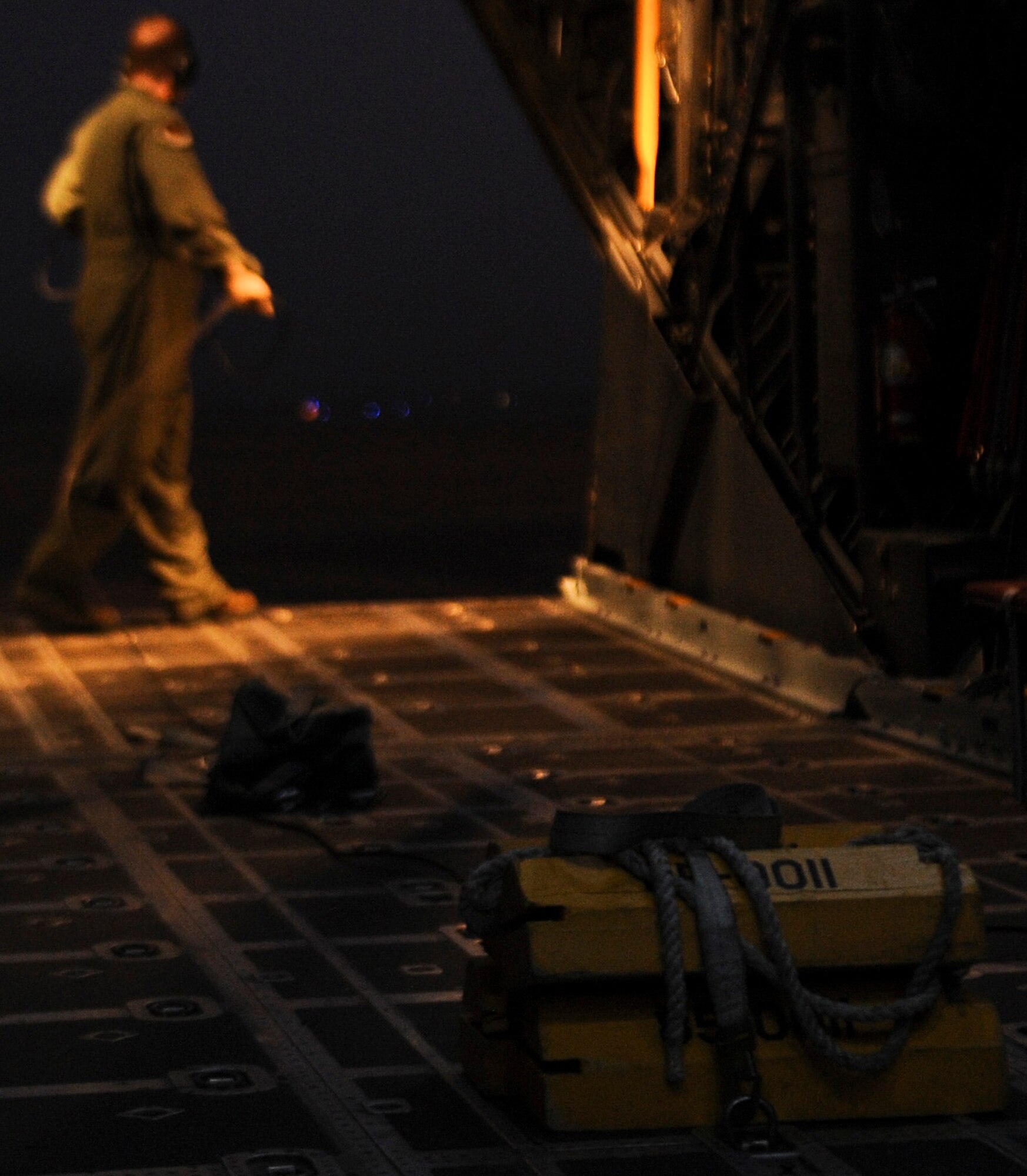 Master Sgt. Terry Wright, 15th Special Operations Squadron loadmaster, pulls chalks inside the aircraft on the flightline at Hurlburt Field, Fla., Feb. 19, 2014. (U.S. Air Force photo/Senior Airman Michelle Vickers)