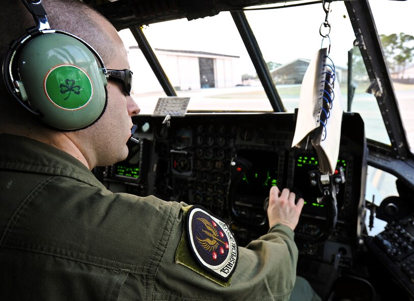 Staff Sgt. Kevin Reilly, 15th Special Operations Squadron flight engineer, tests steering functions on a MC-130H Combat Talon II on the flightline at Hurlburt Field, Fla., Feb. 19, 2014. (U.S. Air Force photo/Senior Airman Michelle Vickers)