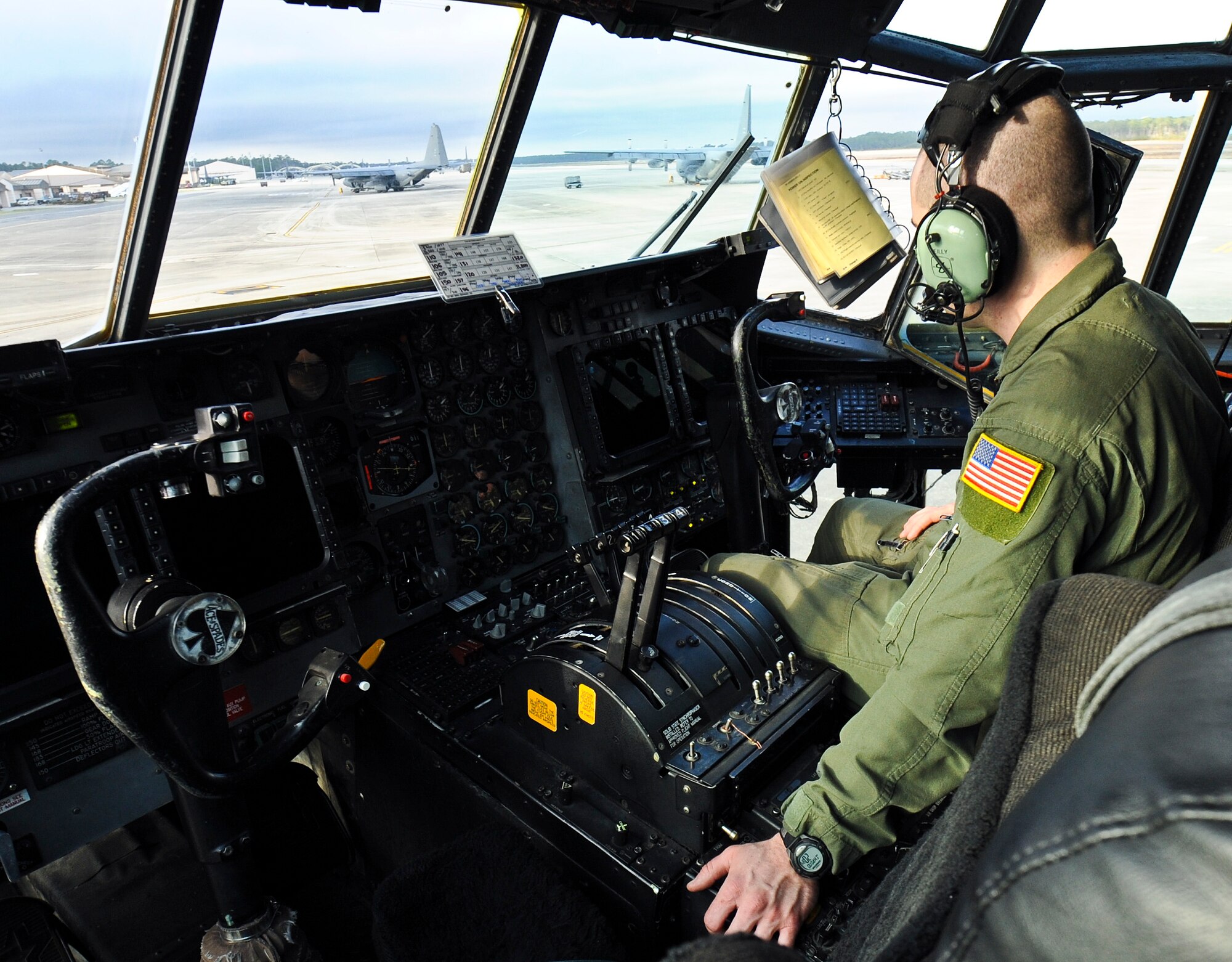 Staff Sgt. Kevin Reilly, 15th Special Operations Squadron flight engineer, tests electronic functions on a MC-130H Combat Talon II on the flightline at Hurlburt Field, Fla., Feb. 19, 2014. (U.S. Air Force photo/Senior Airman Michelle Vickers)