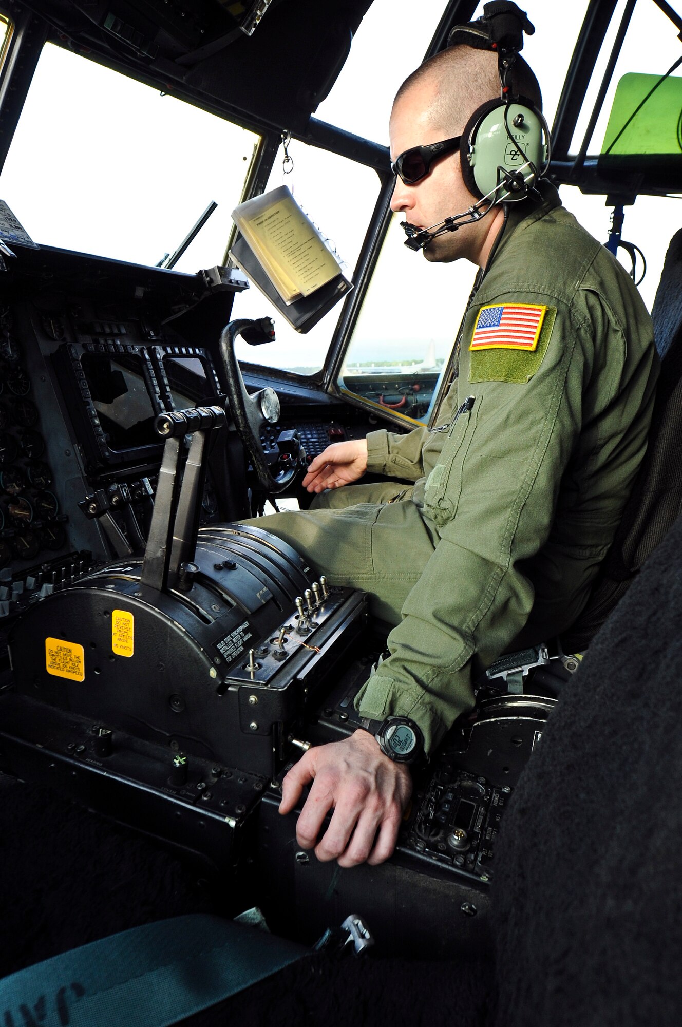 Staff Sgt. Kevin Reilly, 15th Special Operations Squadron flight engineer, tests electronic functions on a MC-130H Combat Talon II on the flightline at Hurlburt Field, Fla., Feb. 19, 2014. (U.S. Air Force photo/Senior Airman Michelle Vickers)