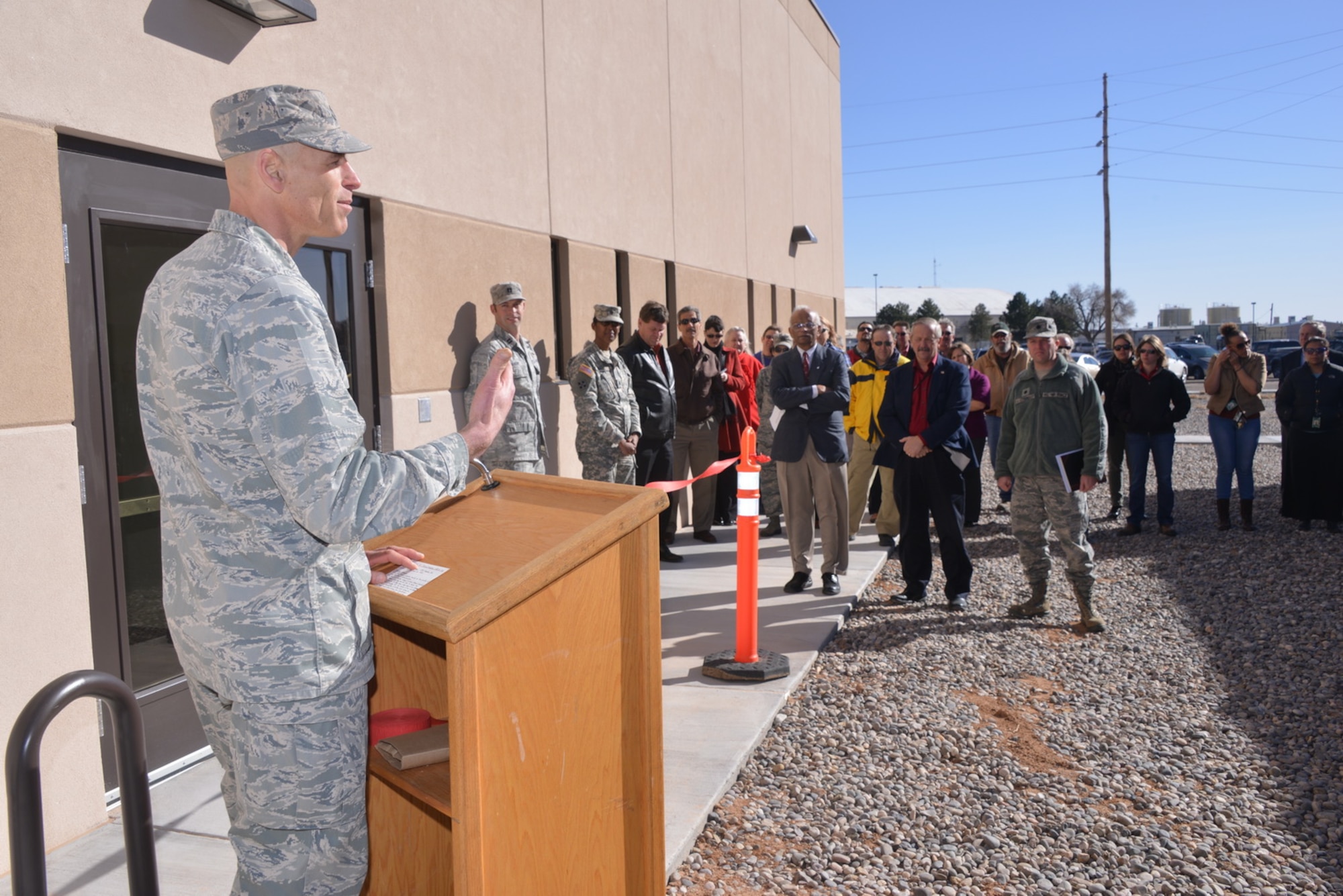 Col. David Goldstein, Phillips Research Site Commander and Space Vehicles Directorate Director, speaks at a ribbon cutting event for the Infrared Radiation Effects Laboratory, the newest Air Force Research Laboratory building. The IRREL houses the capability for performing and evaluating maturing radiation technology for space-based platforms. (Photo by Todd Berenger)