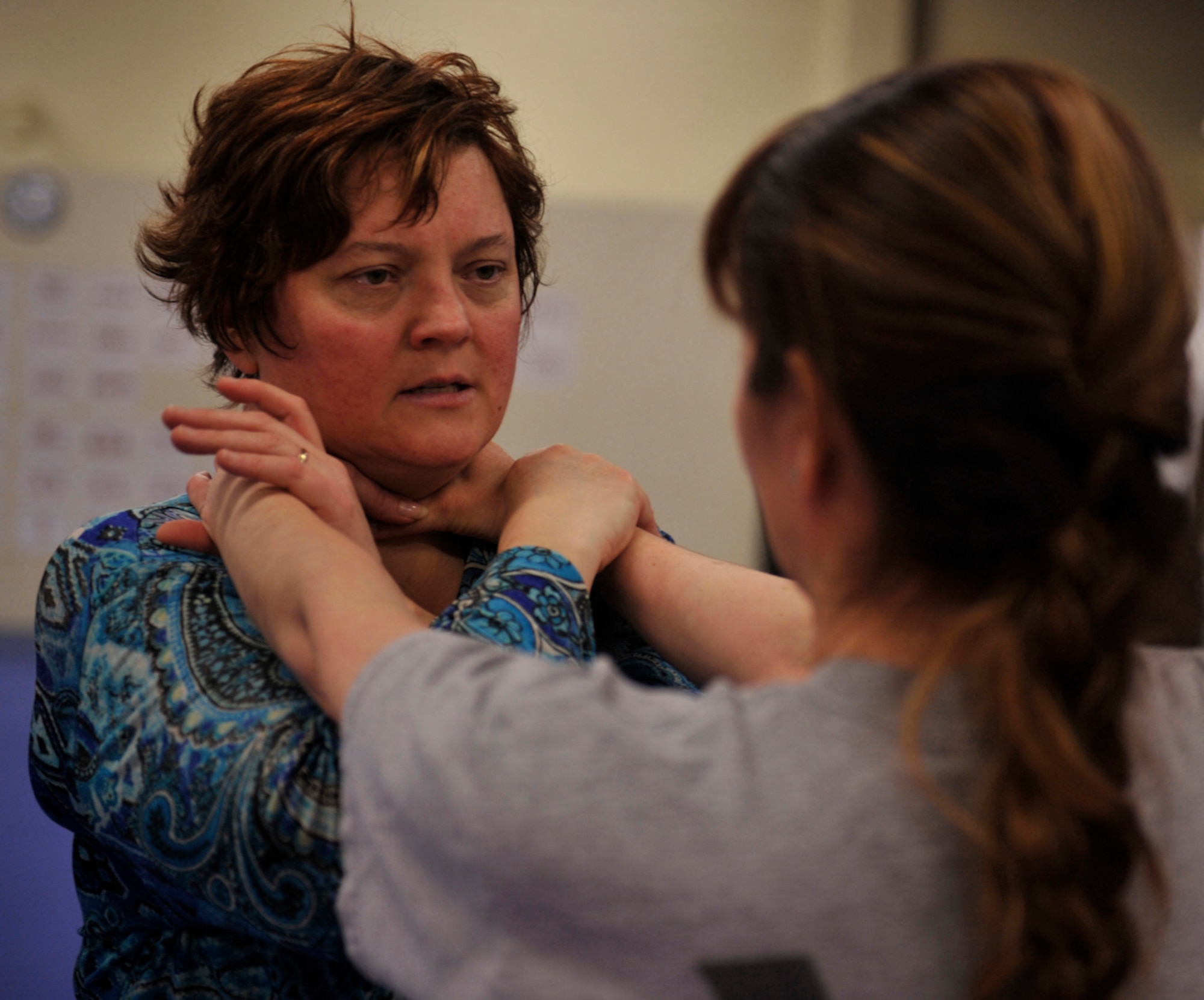 Angie Erickson, Sexual Harassment/Assault Response and Prevention victim advocate, practices defensive countermeasures during a self-defense class at the Arctic Warrior Combatives Academy on Joint Base Elmendorf-Richardson Feb. 23. The class teaches women a variety of moves to get away from attackers. (U.S. Air Force photo/Airman 1st Class Tammie Ramsouer)