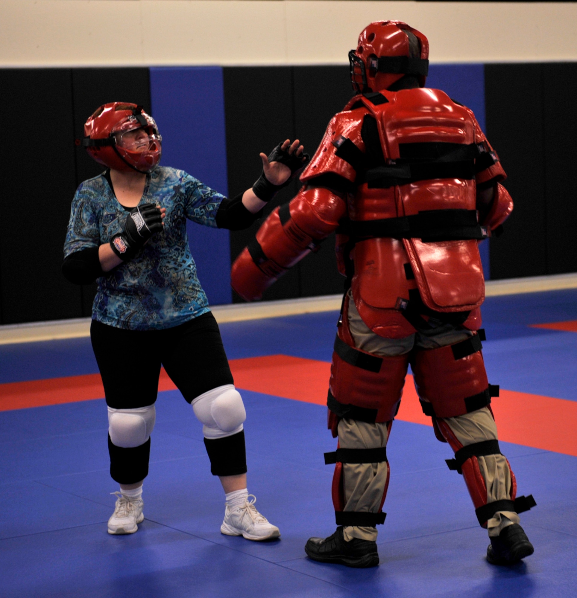 Angie Erickson, Sexual Harassment/Assault Response and Prevention victim advocate, prepares to defend herself during a self-defense class at the Arctic Warrior Combatives Academy on Joint Base Elmendorf-Richardson Feb. 23. This self-defense class prepares women to defend themselves if they are attacked. (U.S. Air Force photo/Airman 1st Class Tammie Ramsouer)
