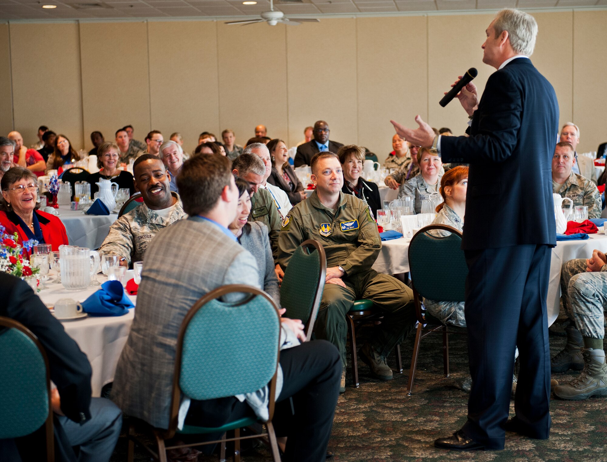 Dan Clark, self-proclaimed inspirational speaker, addresses a sold-out audience at Eglin’s National Prayer Breakfast Feb. 25. Known best as a best-selling author and one of 195 speakers in the national hall of fame, Clark was asked to speak to Team Eglin by the base chapel because of the speaker’s inspiration, particularly notable in Clark’s role as primary contributing author of the Chicken Soup for the Soul series. This year marks America’s 61st annual observance of the National Prayer breakfast which celebrates the moral and spiritual values the nation was founded on. (U.S. Air Force photo/Chrissy Cuttita)